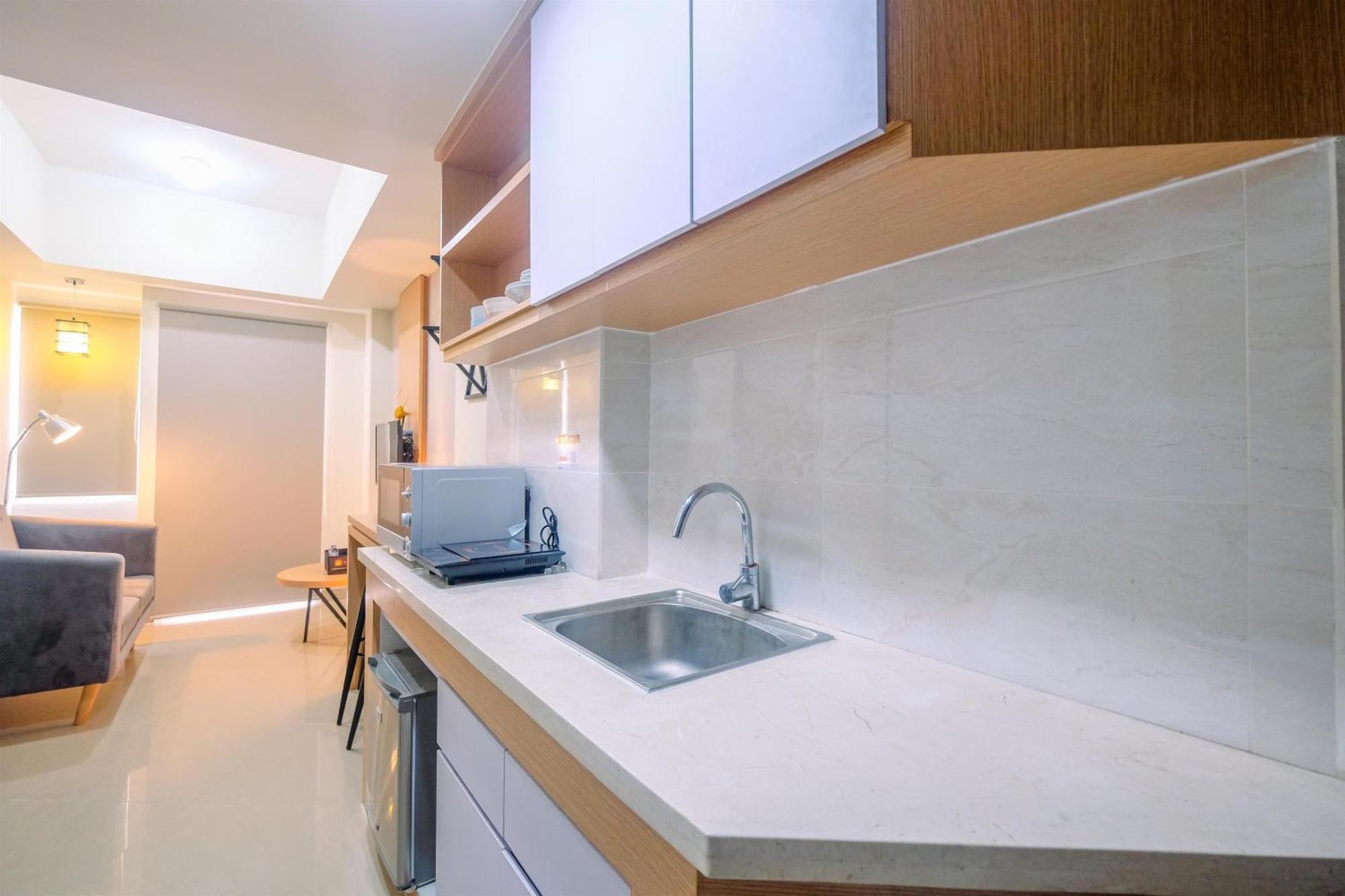 Comfort 1br At Mustika Golf Residences By Travelio Apartemen